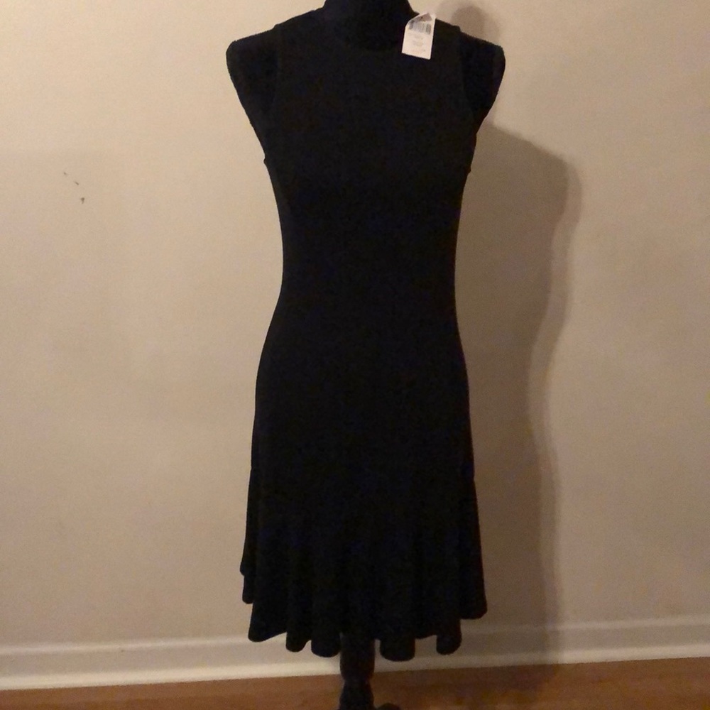 Ralph Lauren black dress- 96 viscose, 4  elastane. From armpits measures 17 in.